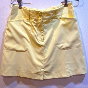 Nike yellow dri-fit golf skort, size 6